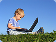 Child with laptop - "Easy-to-use websites"